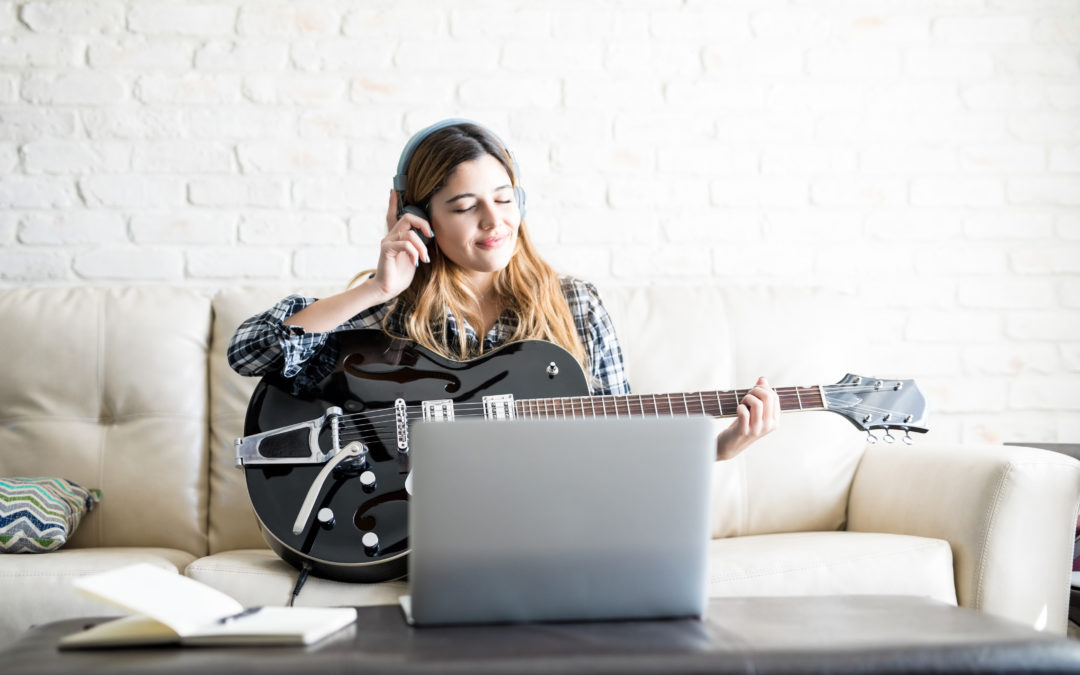 Woman Listening To A New Tune On Headphones