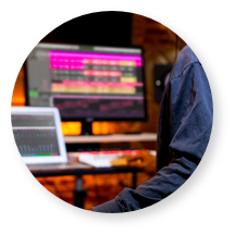 male producer, musician, composer making a song in home recording